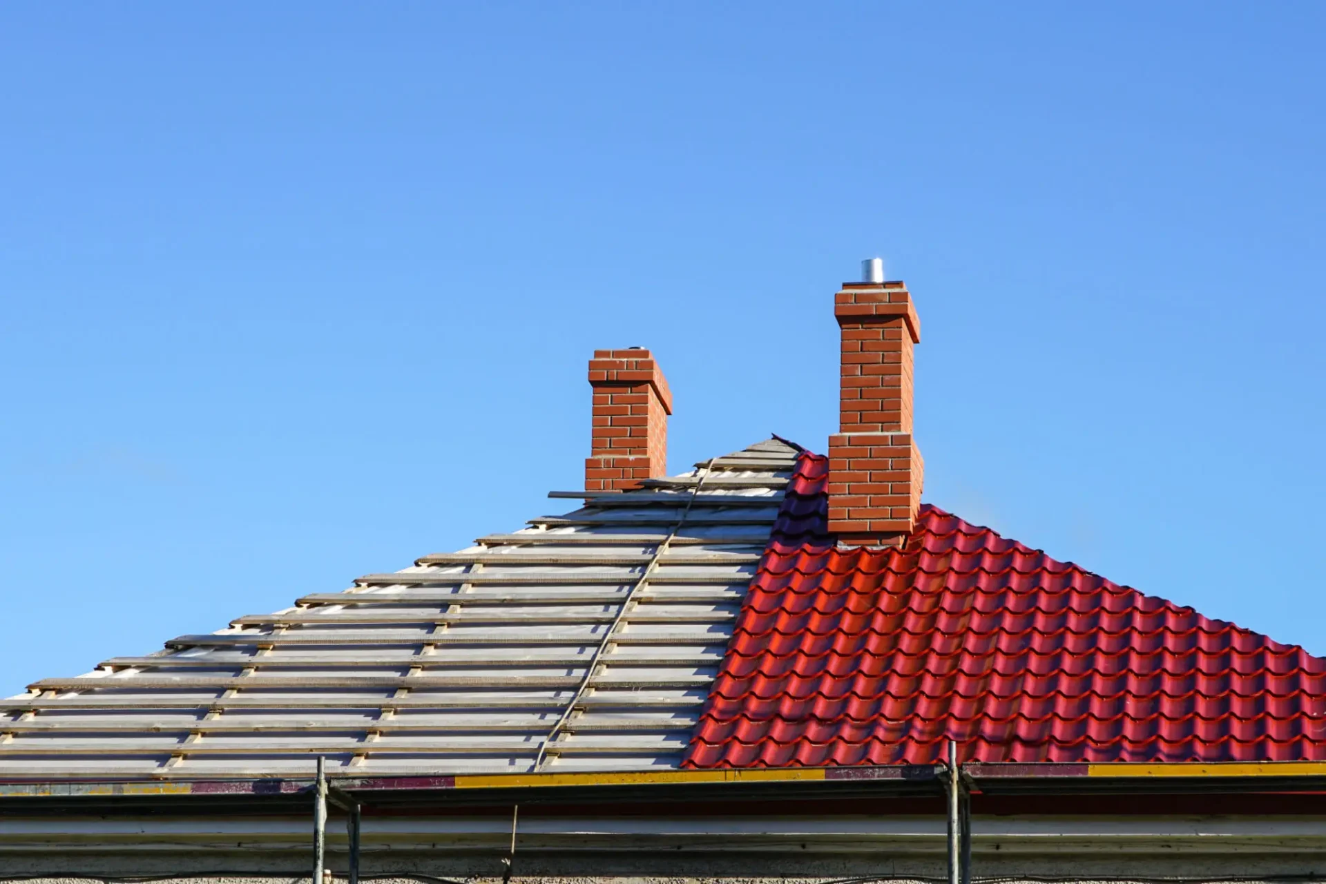 Half-finished tiled roof restoration